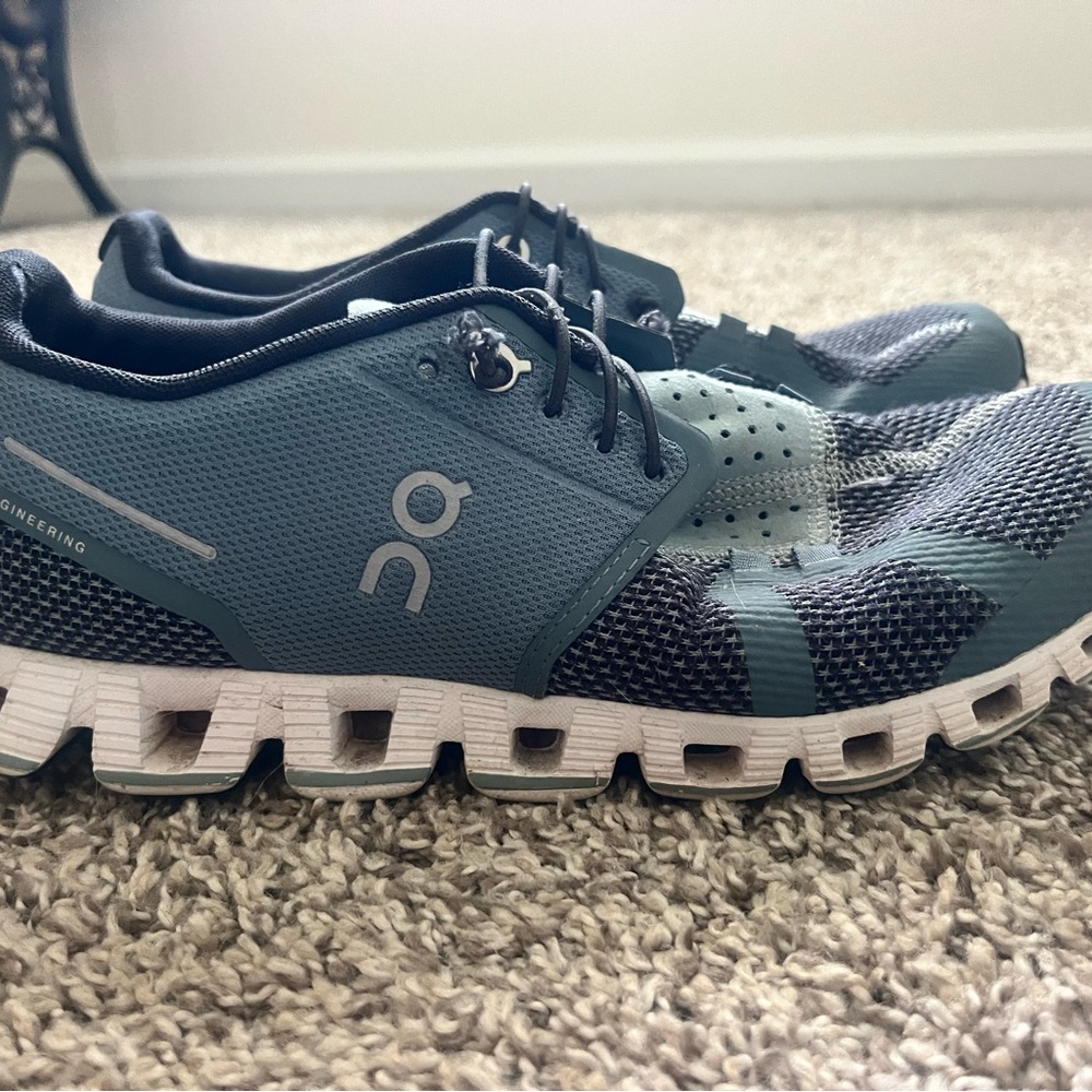 On Running Black and Gray Athletic Shoes with CloudTec Sole